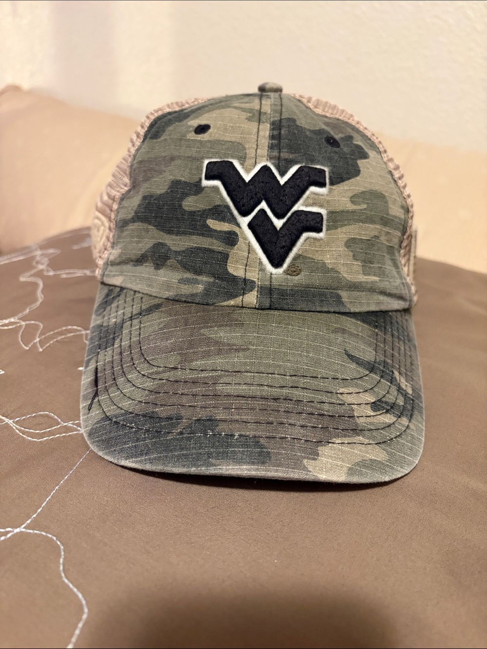 Top of the World Camo Trucker Hat with Black WV Patch and Tan Mesh